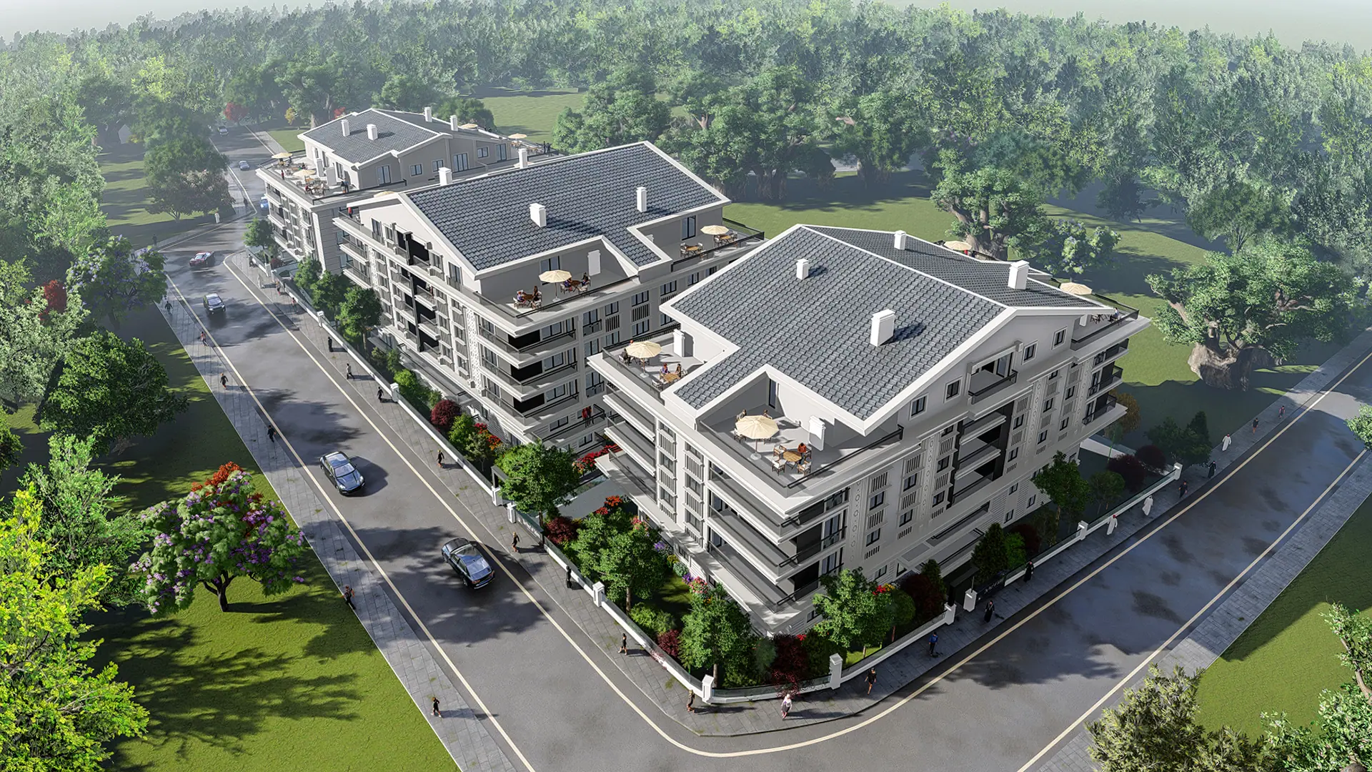 Gündüz kuş bakışı: bloklar, otopark ve peyzaj alanı