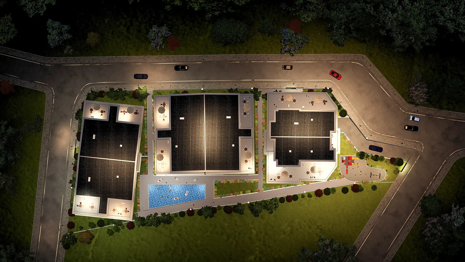 Aydınlatılmış yürüyüş aksları ve otopark alanı
